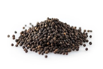 A pile of black pepper grains on a clean white surface, perfect for use in photography or design projects