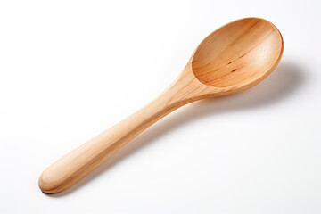 A little wooden spoon isolated on clear white background