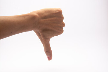 female hand thumbs down show the bad or unlike isolated on white