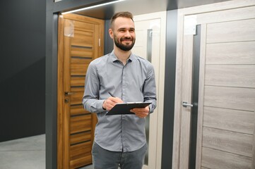 sales consultant standing near the interior door