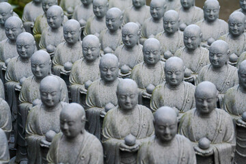Rows of Stone Buddha Statues