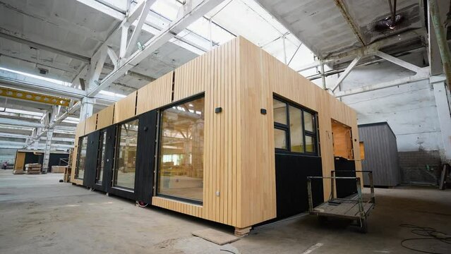 Modern mobile prefabricated modular home at a construction site