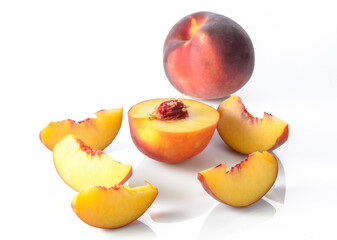 Sweet ripe peaches on white background