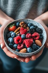 Healthy Snack Bowl with Mixed Berries and Nuts in a Cozy Kitchen Setting for Nutrition Concepts