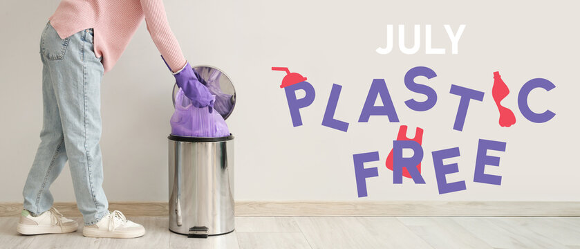 Woman taking garbage bag from trash bin near white wall