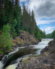 Kivach waterfall in the forest of Karelia, Russia, June 2019