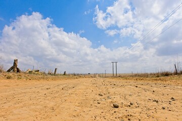 Gravel farm road near Clarens in the Freestate Province of South Africa