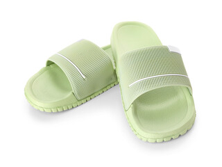 Green female flip flops on white background