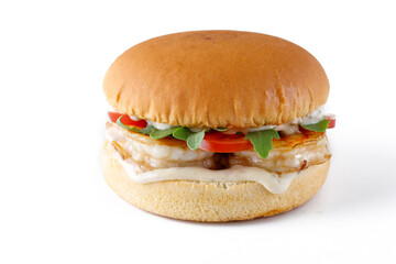 Seafood shrimps burger on white plate on the table, served with white wine, copy space 1