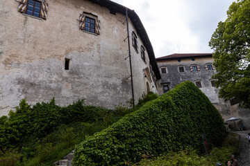 Panoramic view from Lake Bled, beauty heritage in Slovenia. Island with church and castle in the background create a dream setting. View from the castle, museum and court.