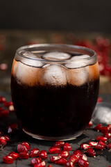 cold pomegranate seed juice with chunks of ice