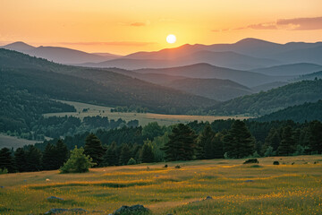 Obraz premium Sunset Serenity Over Rolling Hills