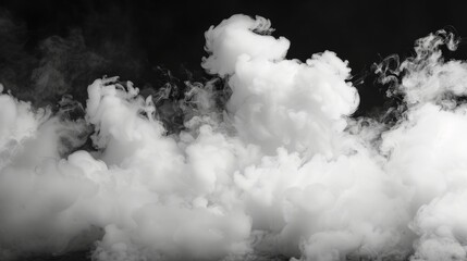 Close-up image of white smoke clouds against a black background, creating an abstract and ethereal visual