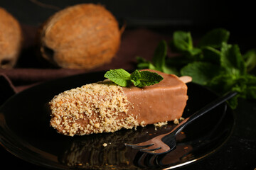 Plate with tasty cheesecake pop, closeup