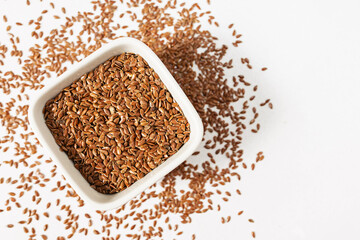 Flaxseed in the bowl, healthy diet, nutrient rich ingredient