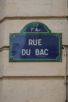 typical vintage parisian street name sign , rue du Bac