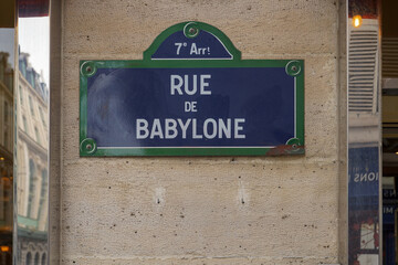 typical vintage parisian street name sign , rue de Babylone