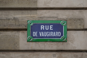 Obraz premium typical vintage parisian street name sign , rue de Vaugirard