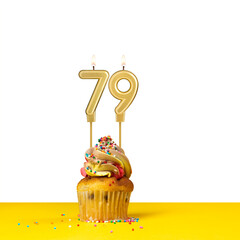 Birthday candle number 79 - Cupcake on white background