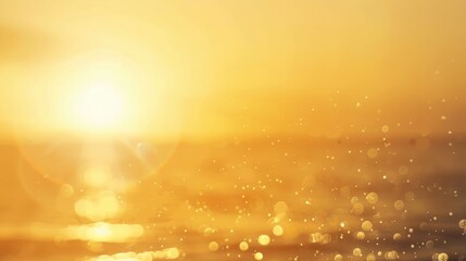 A beautiful golden sunrise with sparkling bokeh lights reflecting over water, creating a warm and tranquil morning scene.