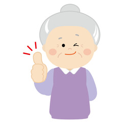 サムズアップするシニアの女性