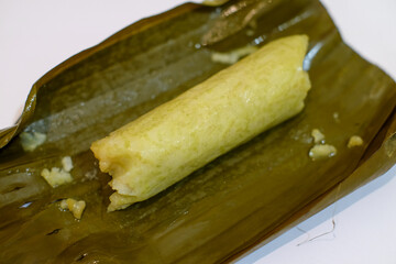 Lontong is an Indonesian dish. Rice is rolled inside a banana leaf and boiled, a staple food replacement of steamed rice.