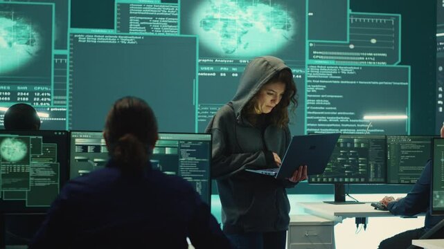 Hackers group failing to hack a system in high tech agency office, reading critical error message on big screen. Specialists trying to steal important database information from rival states. Camera A.