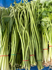 green yard long beans in a market