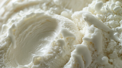 Artisan coconut ice cream, a closeup image of artisan coconut ice cream, its creamy texture and white color highlighted against a stark background