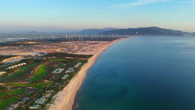 Wind turbines at FLC Nhon Ly seaside, turbine rotating to make green alternative energy with cheap for indusrtry and save environment