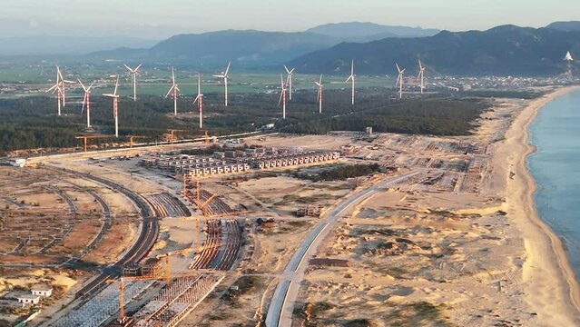 Wind turbines at FLC Nhon Ly seaside, turbine rotating to make green alternative energy with cheap for indusrtry and save environment
