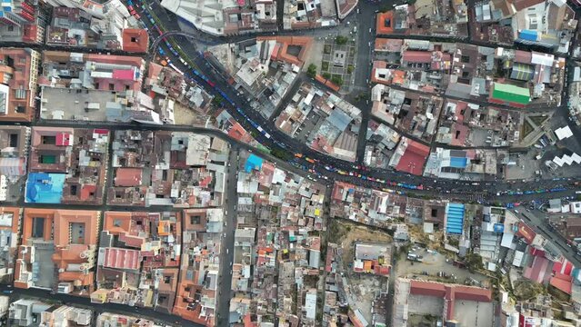 Aerial video over the capital city of La Paz in Blovia, South America