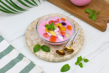 Sop Buah or Mix fruits ice one of popular fruits ice in Indonesia, especially for iftar ramadan. White background.