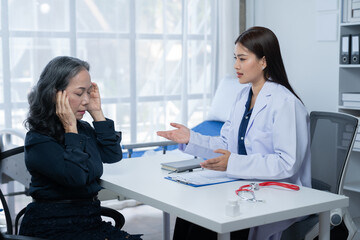 During a consultation in the office, female patients received advice on options and engaged in discussions about their overall health and treatment plans. This interaction between medical professional