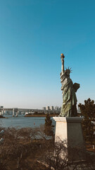 Odaiba, Tokyo. March 13, 2024: Statue of Liberty in Tokyo with beautiful sunset. 