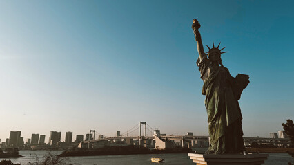 Odaiba, Tokyo. March 13, 2024: Statue of Liberty in Tokyo with beautiful sunset. 