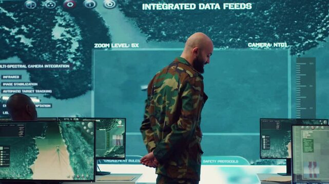 Lieutenant general coordinating his army troops for a complex military operations, ensuring every unit is synchronized and informed about a new national safety mission. Command center. Camera A.