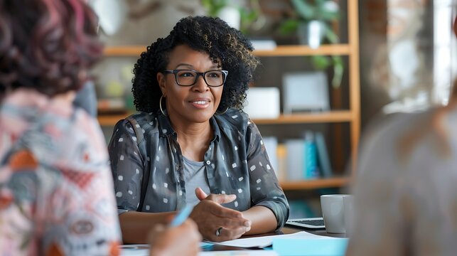 A financial advisor holding a financial literacy class for community members, teaching budgeting techniques, saving strategies, and the benefits of long-term financial planning