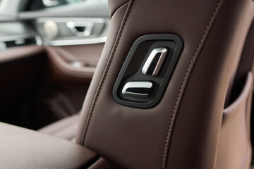 Explore the intricate functions of premium luxury car seat control buttons in detail