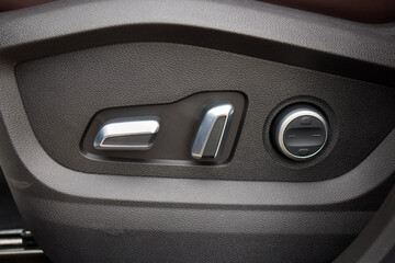Explore the intricate functions of premium luxury car seat control buttons in detail