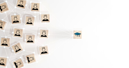 Male and female student icons on wooden blocks. Education concept for success.