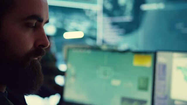 Major general of the army inspecting enemy ships trajectory via gps satellite world map, working on reconnaissance from military base of operations. Navy defense program specialist. Camera B.