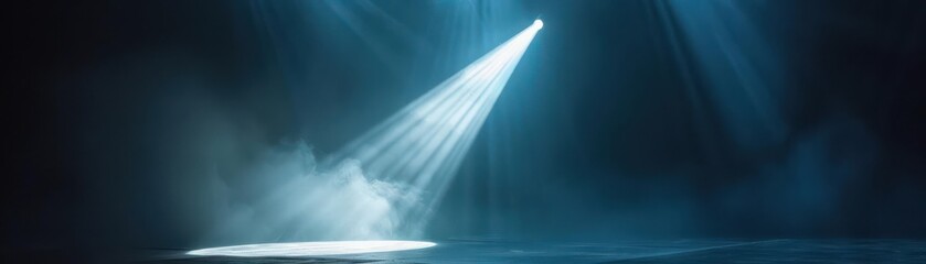Fototapeta premium Single spotlight shining on center stage, direct beam of light, revealing stardom and performance
