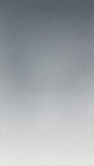 Obraz premium A simple wallpaper background featuring a grainy, uneven circle gradient in shades of white and grey