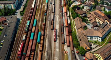 A freight train loaded with containers. Theme of logistics and cargo along railway lines.