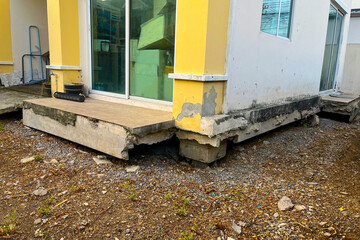 The structure of the house collapsed and the soil around the house collapsed.