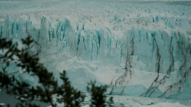 Perito Moreno Glacier Terminus On Lago Argentino With Glacier Cave Revealed. Patagonia, Argentina. pan left shot
