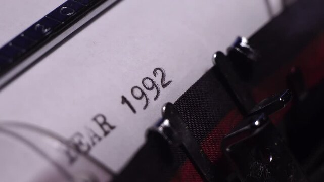Year 1992, Typing on Blank White Paper in Vintage Typewriter, Close Up