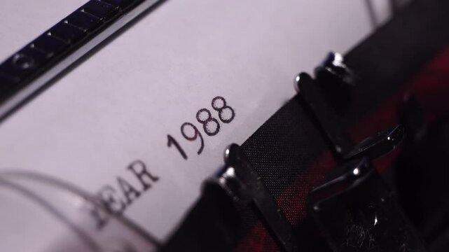 Year 1988, Typing on Blank White Paper in Vintage Typewriter, Close Up