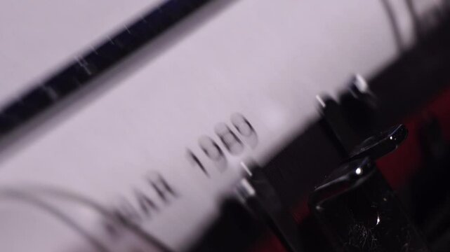 Year 1989, Typing on Blank White Paper in Vintage Typewriter, Close Up